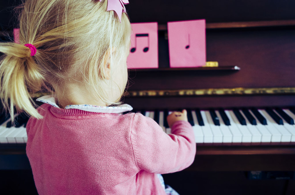 Child playing piano