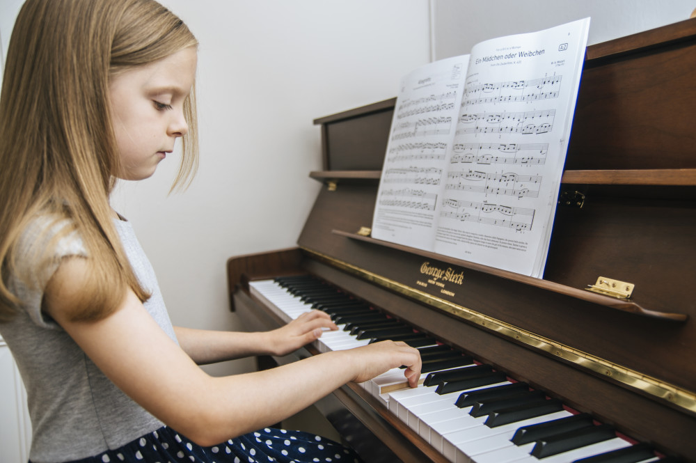 Child playing piano